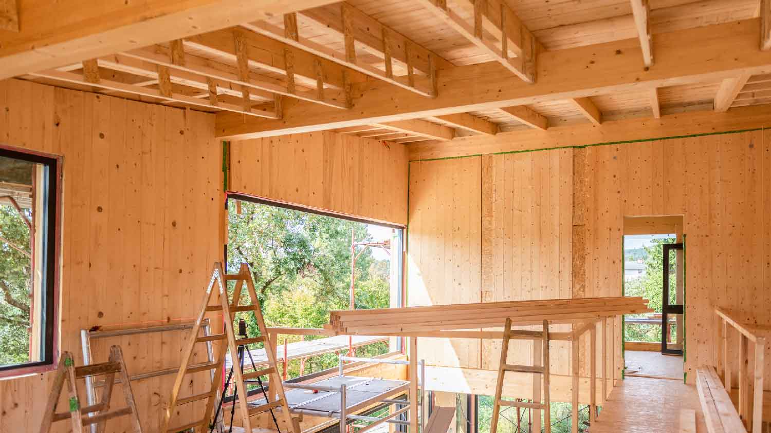 The interior of a construction site with plywood walls