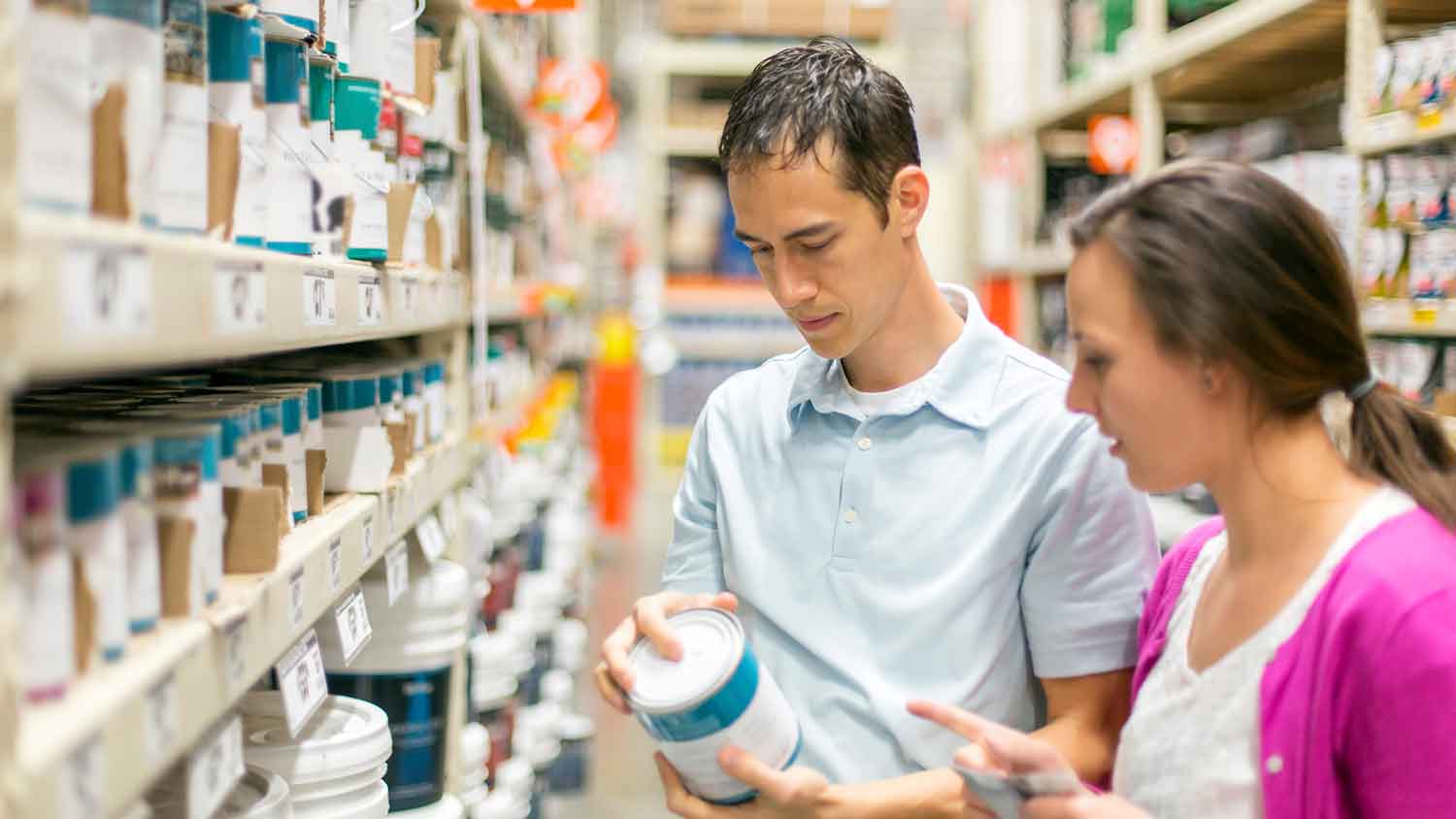 Couple in a store buying exterior paint