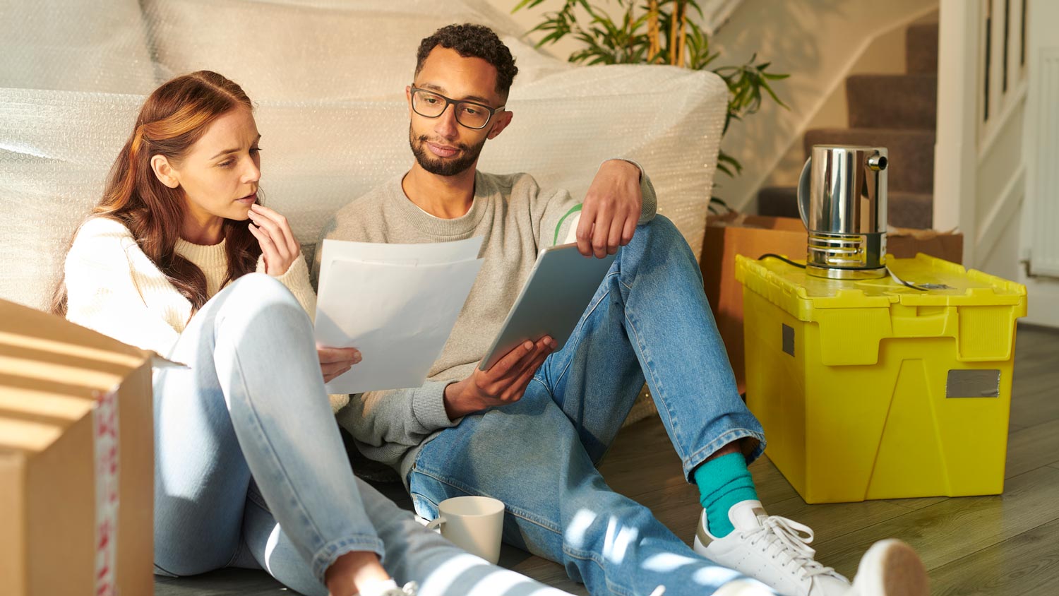 A couple reading the apartment contract