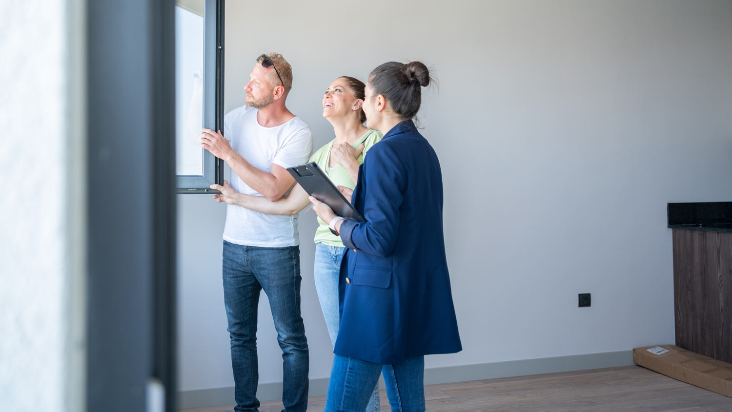 couple and real estate agent