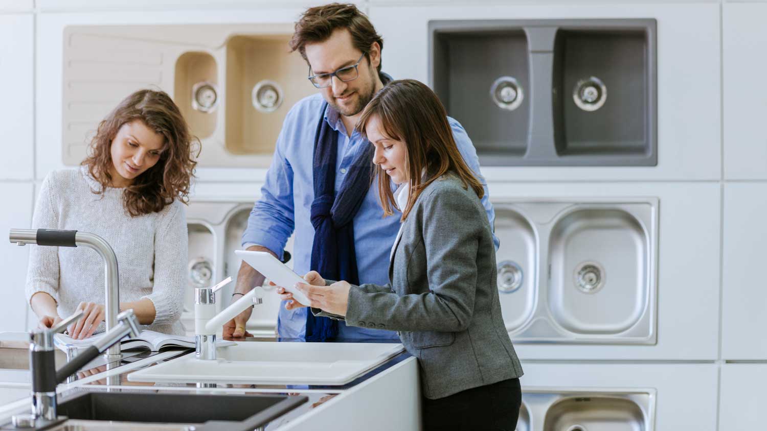 A couple shopping for an outdoor sink