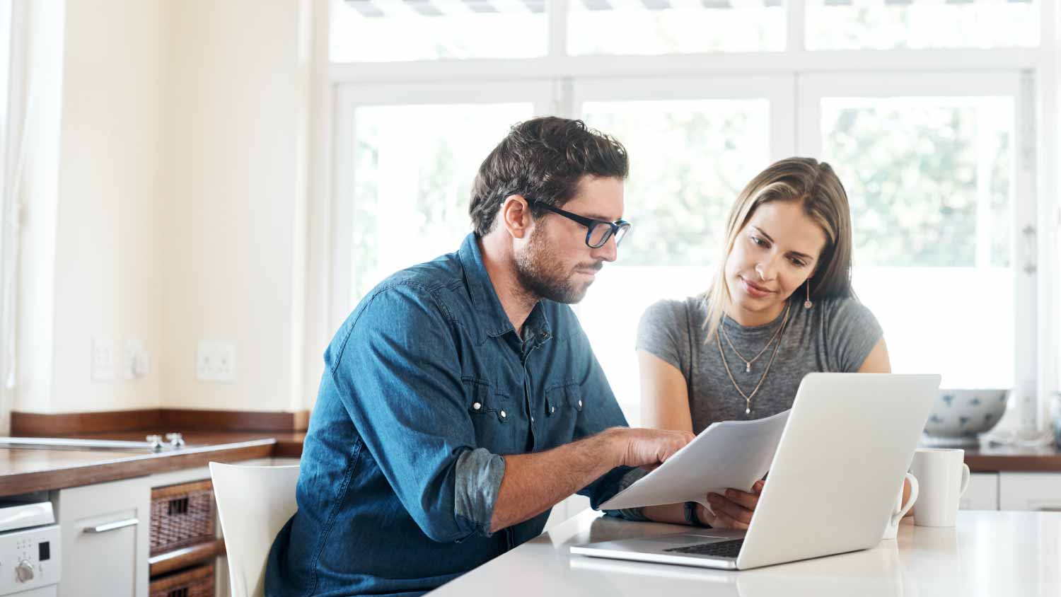 Couple working on their finances together