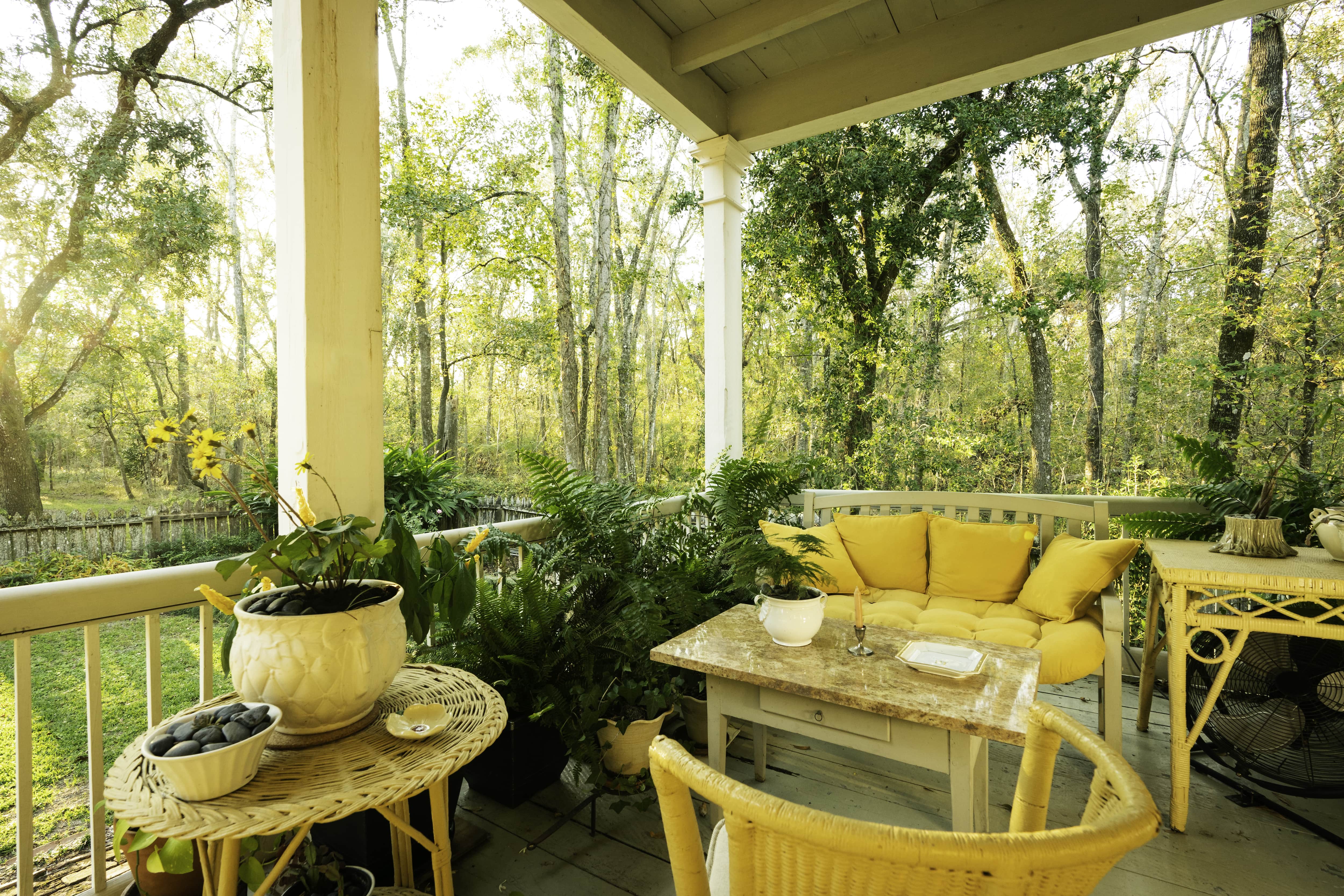 Yellow color scheme on covered porch