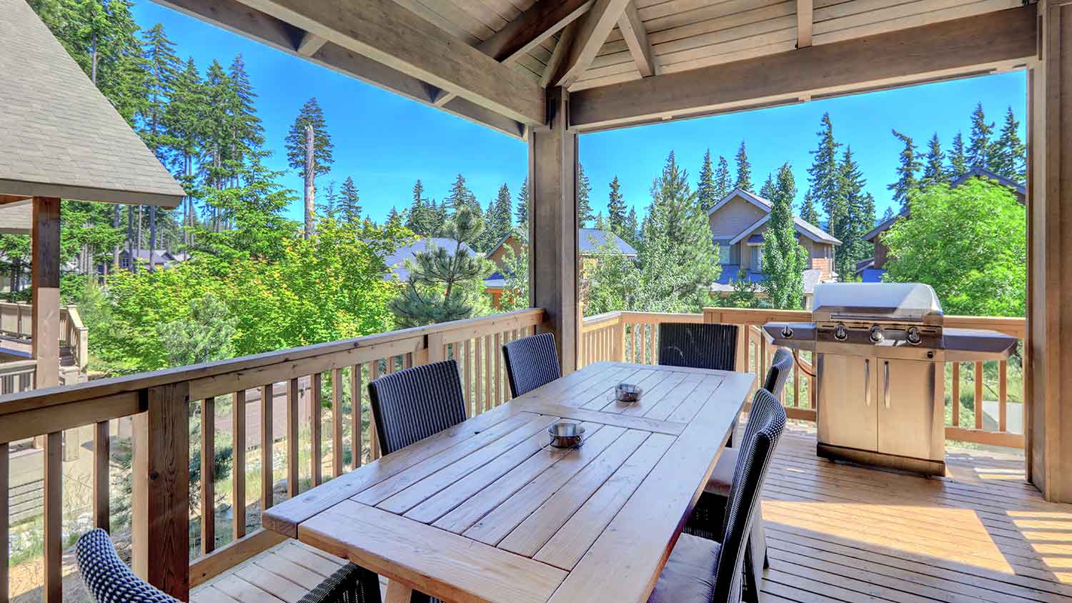 Covered deck with grill and dining table