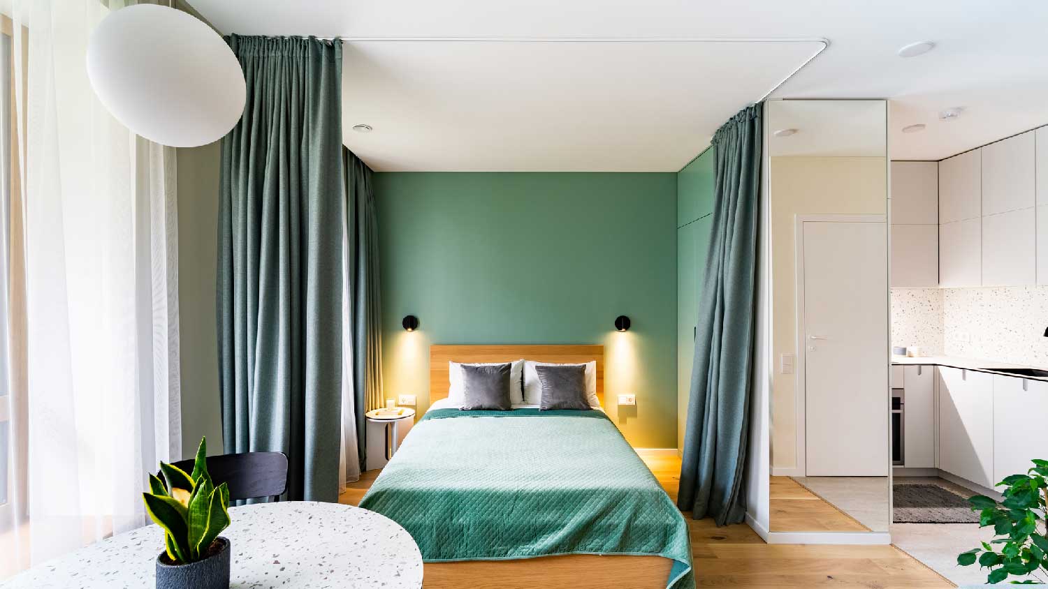 A bedroom with curtains used as its door