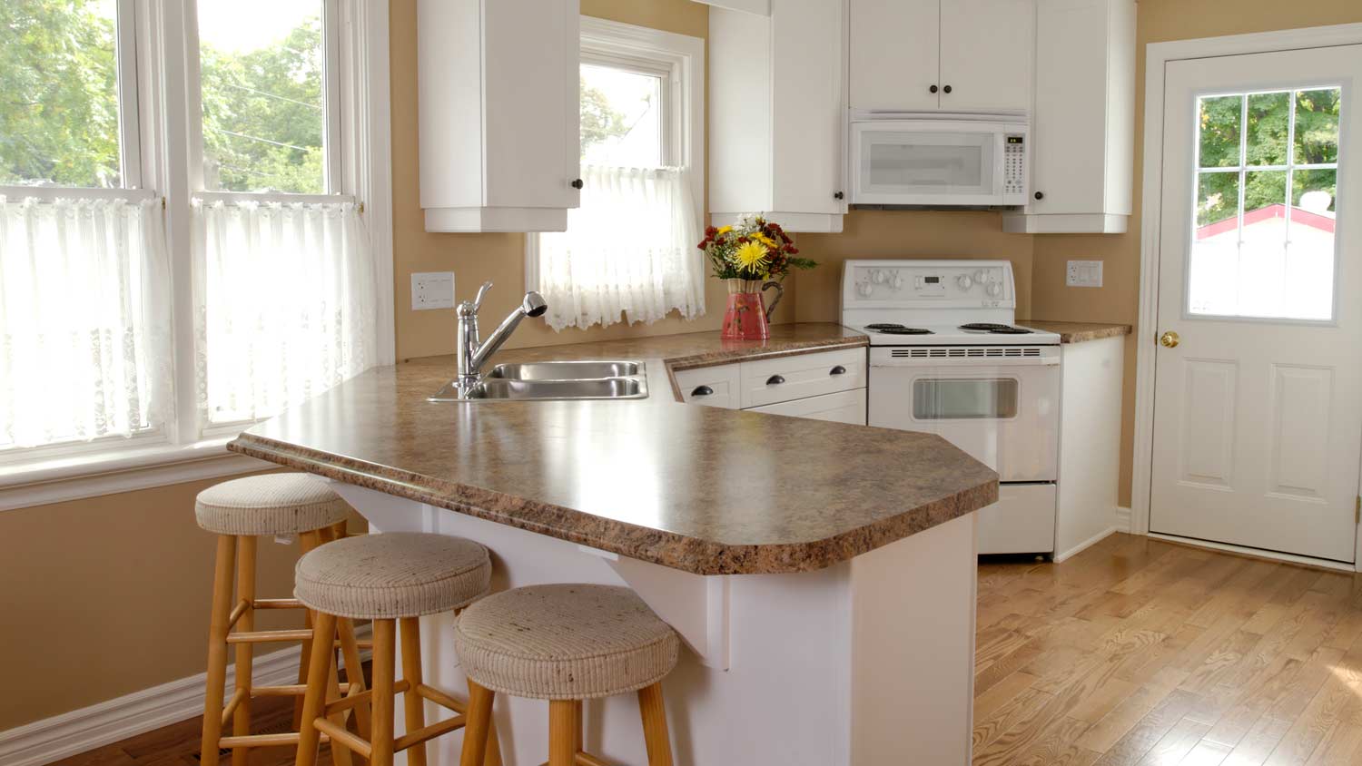 open concept dark beige kitchen