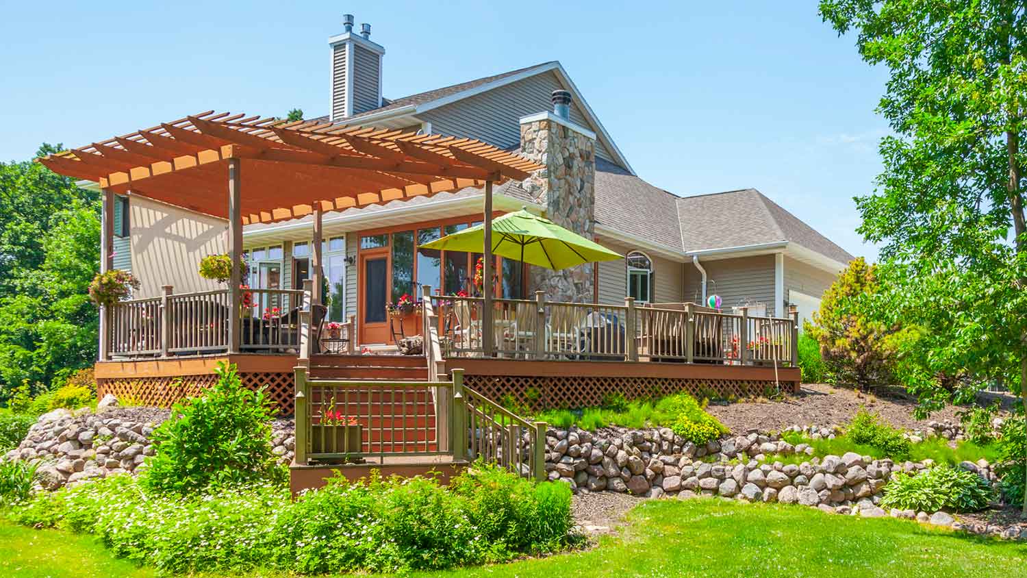 Pergola installed on top of a large patio deck