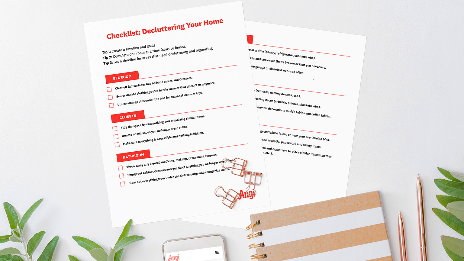 flat lay home office desktop with keyboard, smartphone, notebook and checklist
