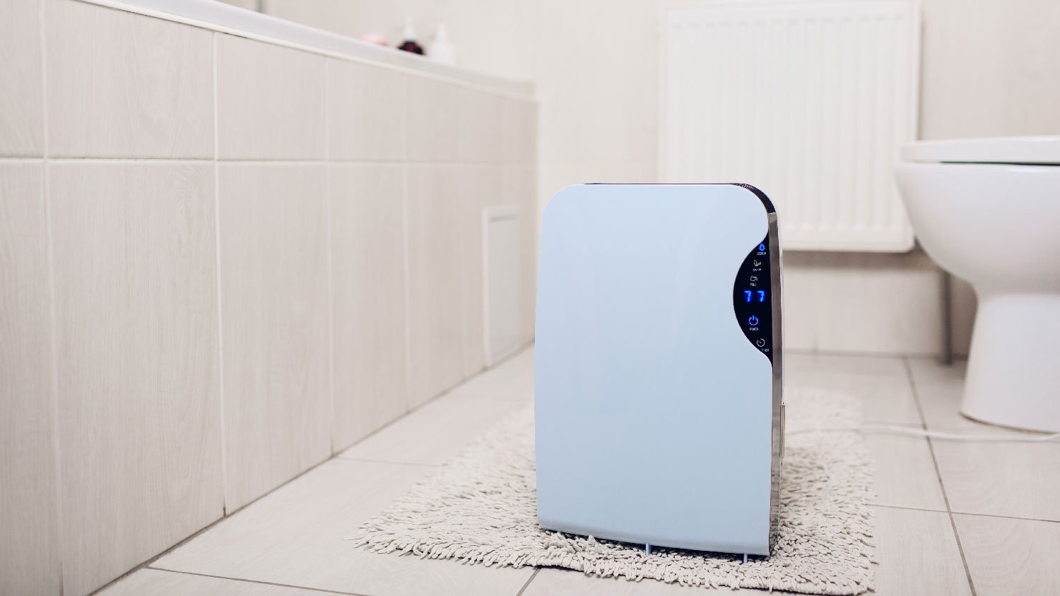 A dehumidifier working on a bathroom