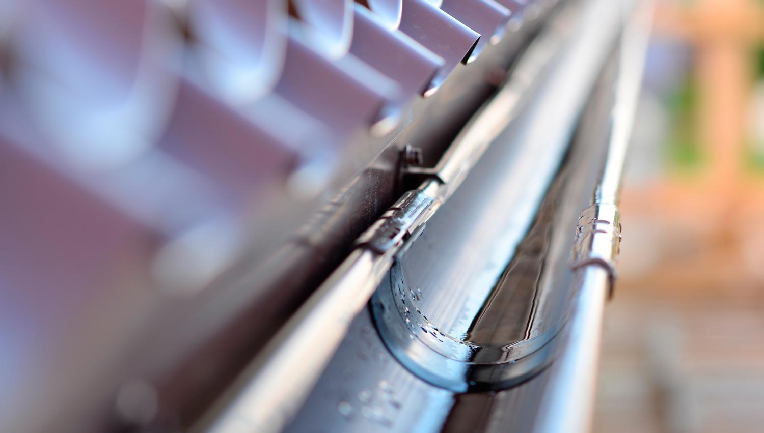 Detail of a connector on regular plastic gutters
