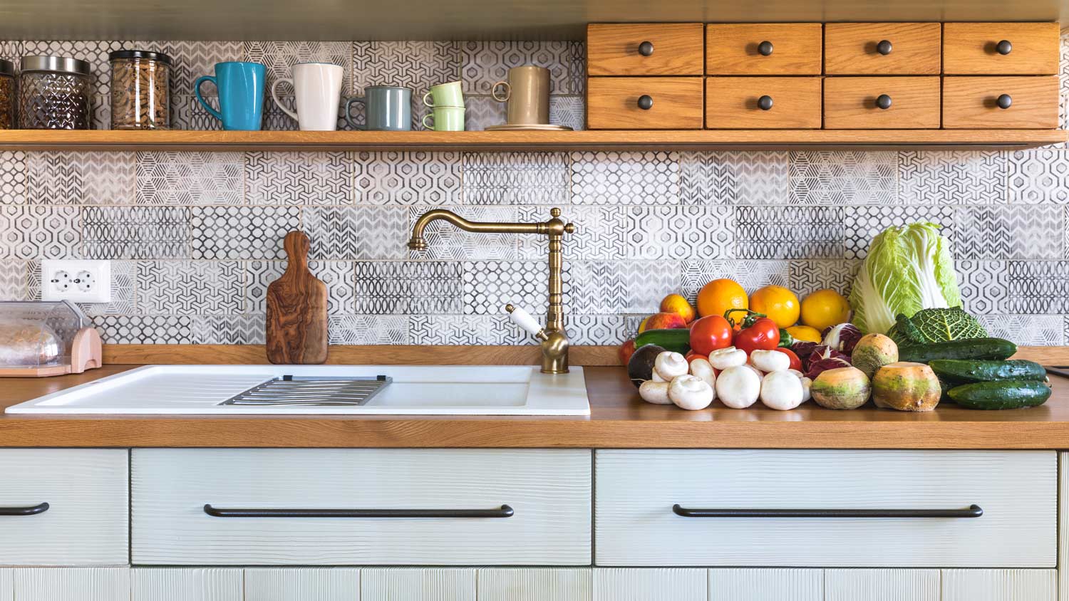 Detail of a rustic kitchen with vegetables on the countertop