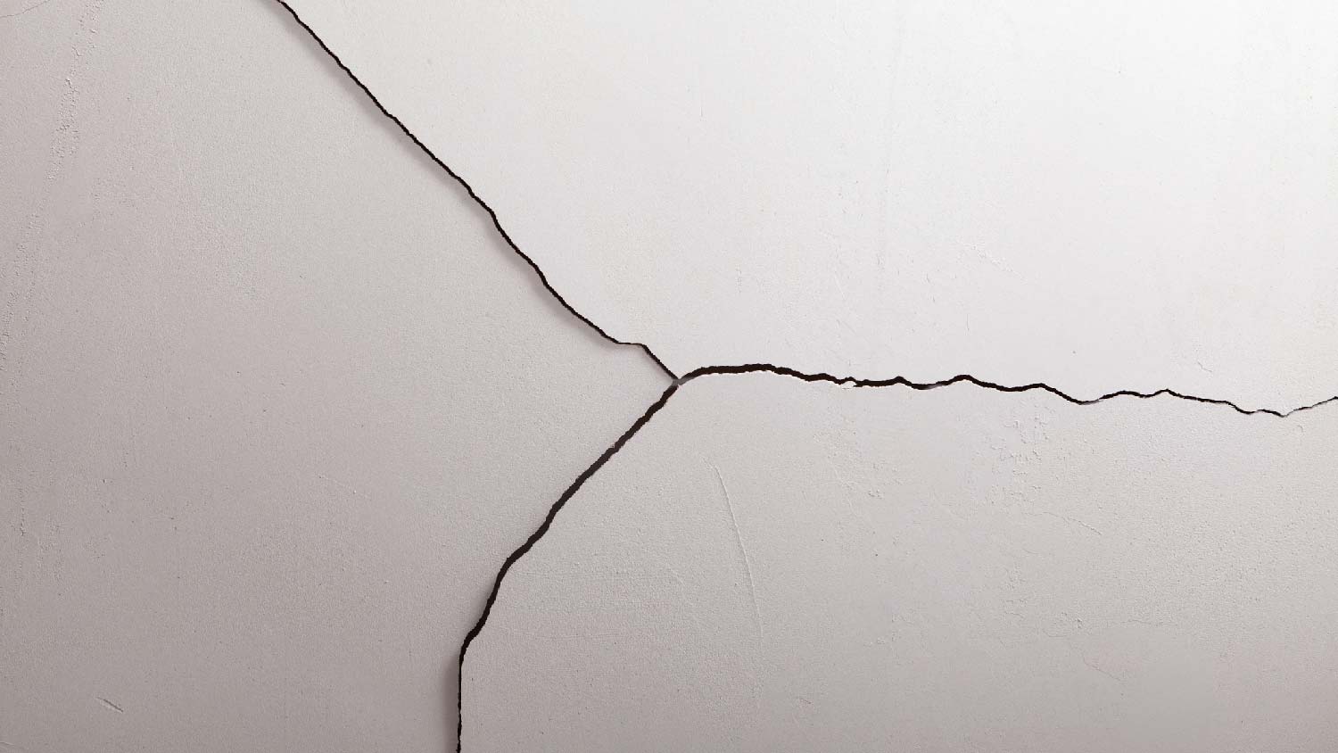 A diagonal crack on drywall