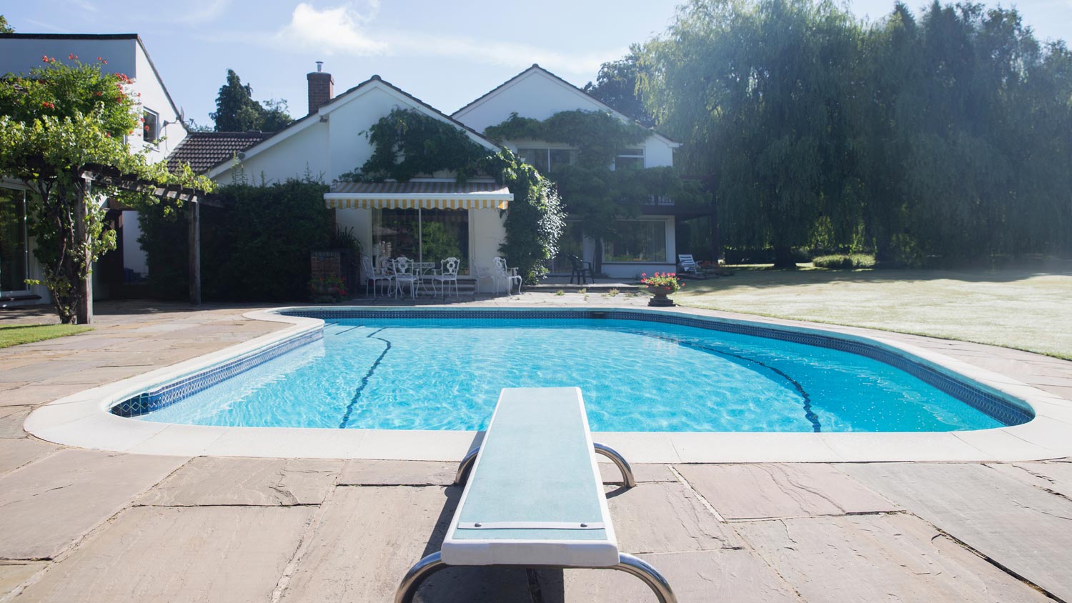 A diving board of a swimming pool