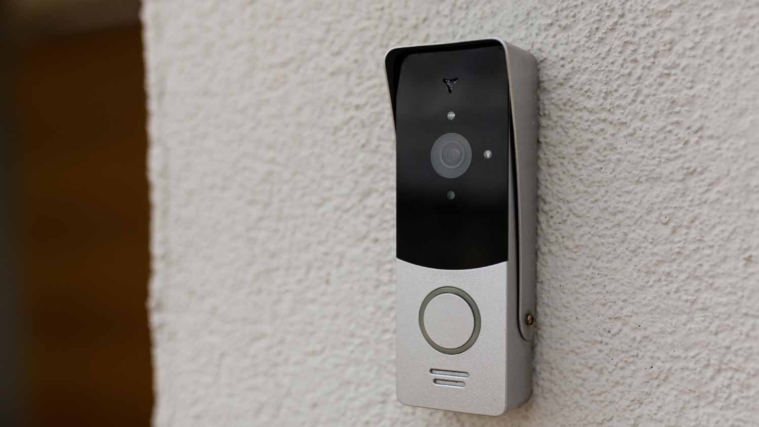 Doorbell on the wall of the house