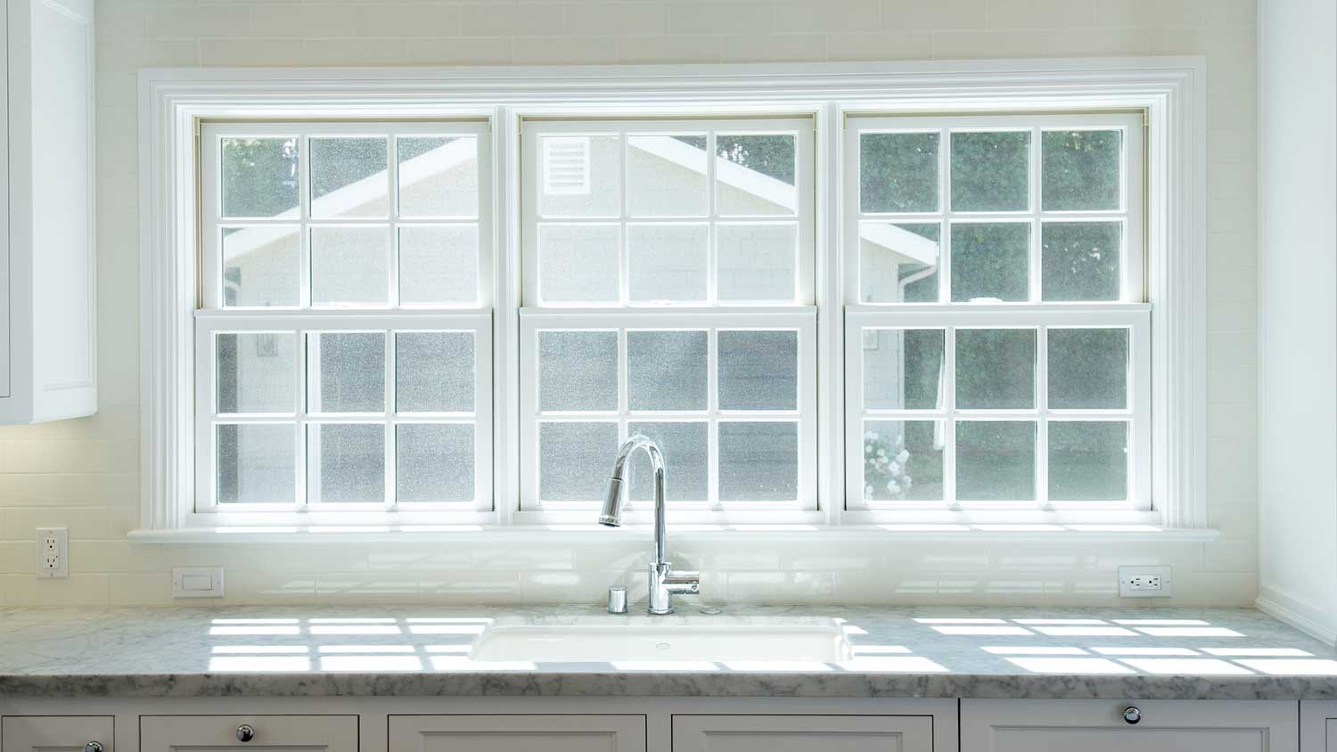 Double hung windows installed in the kitchen 
