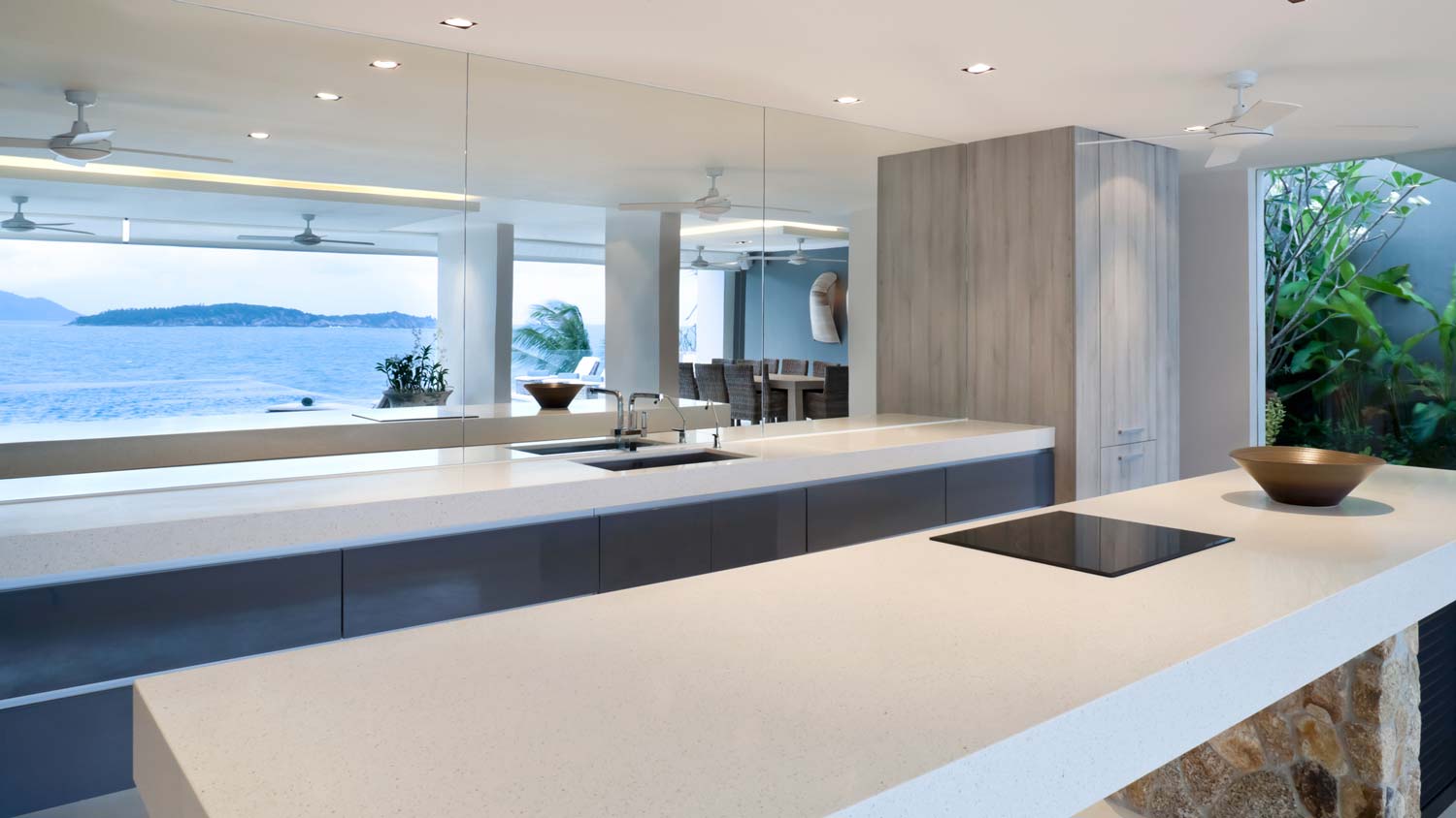 A double island kitchen with ocean views