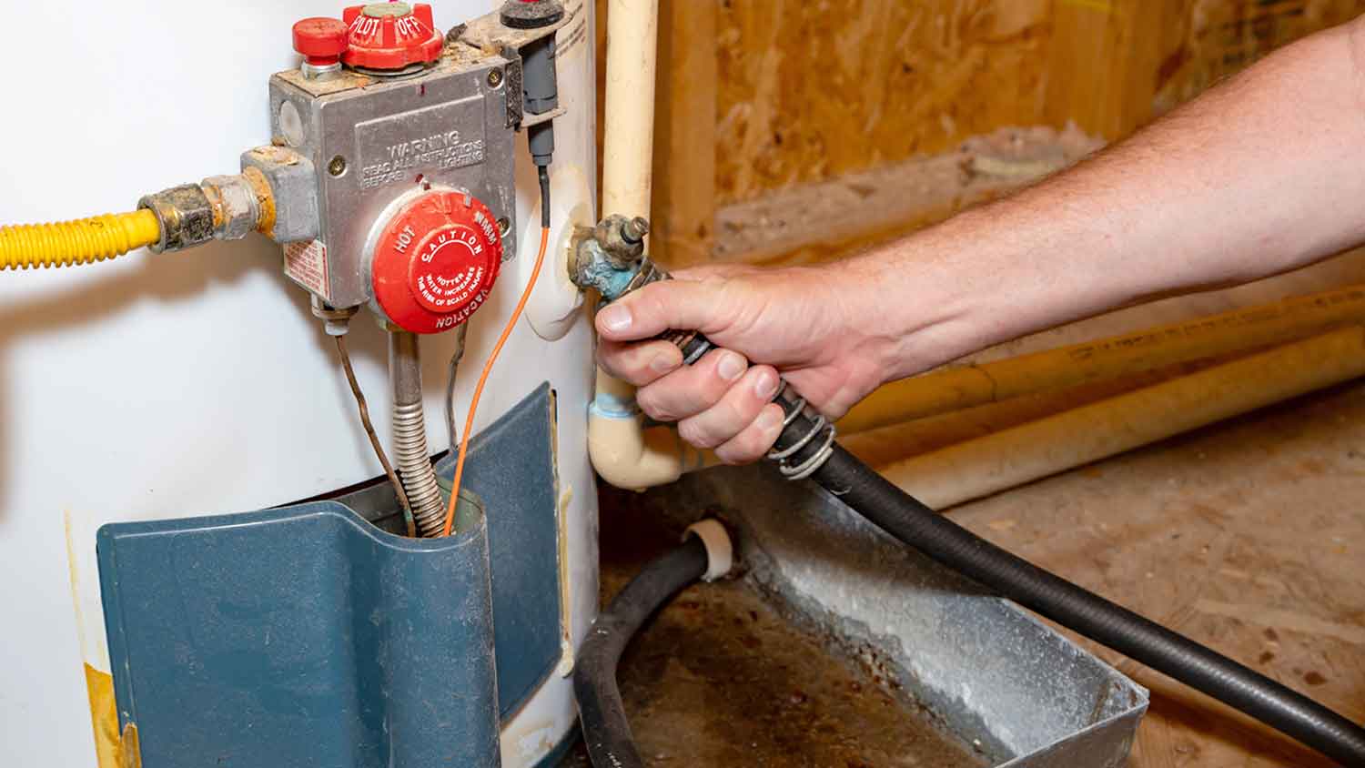 A water heater being drained.