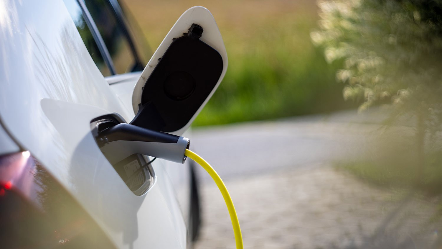 An electric car charges