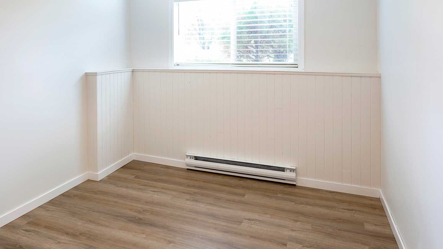 Baseboard heater installed in an empty apartment