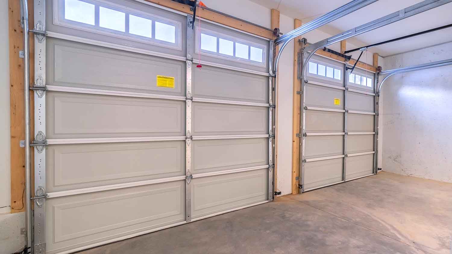 Empty garage interior showing door framing