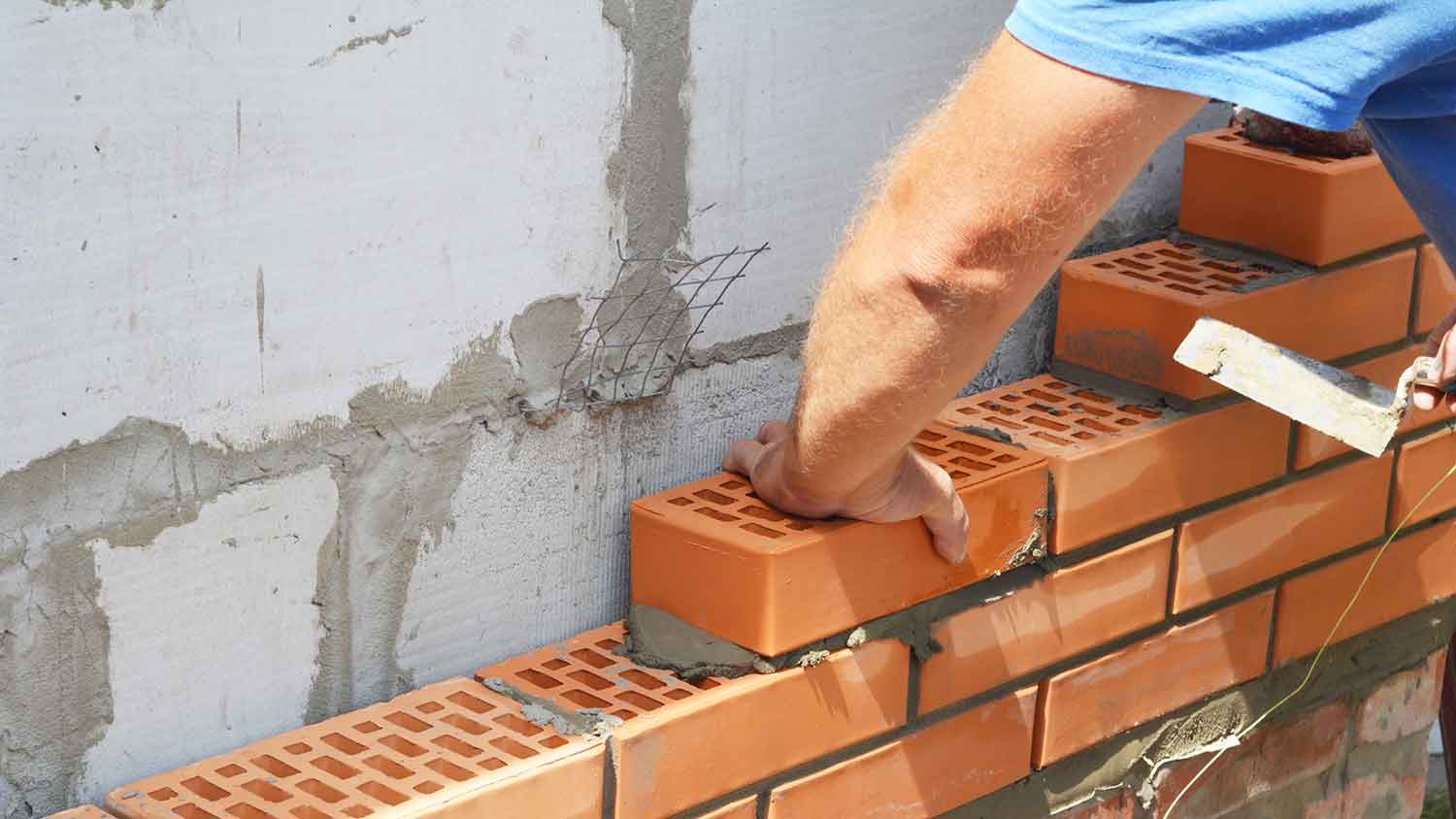 Professional installing engineering bricks
