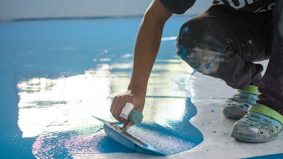 Epoxy resin layer applied over a concrete floor