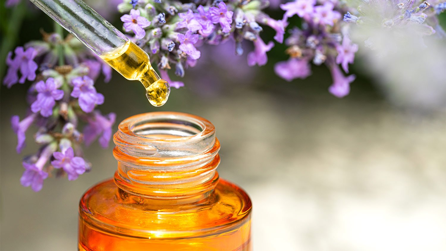 Flowers and essential oil dropper