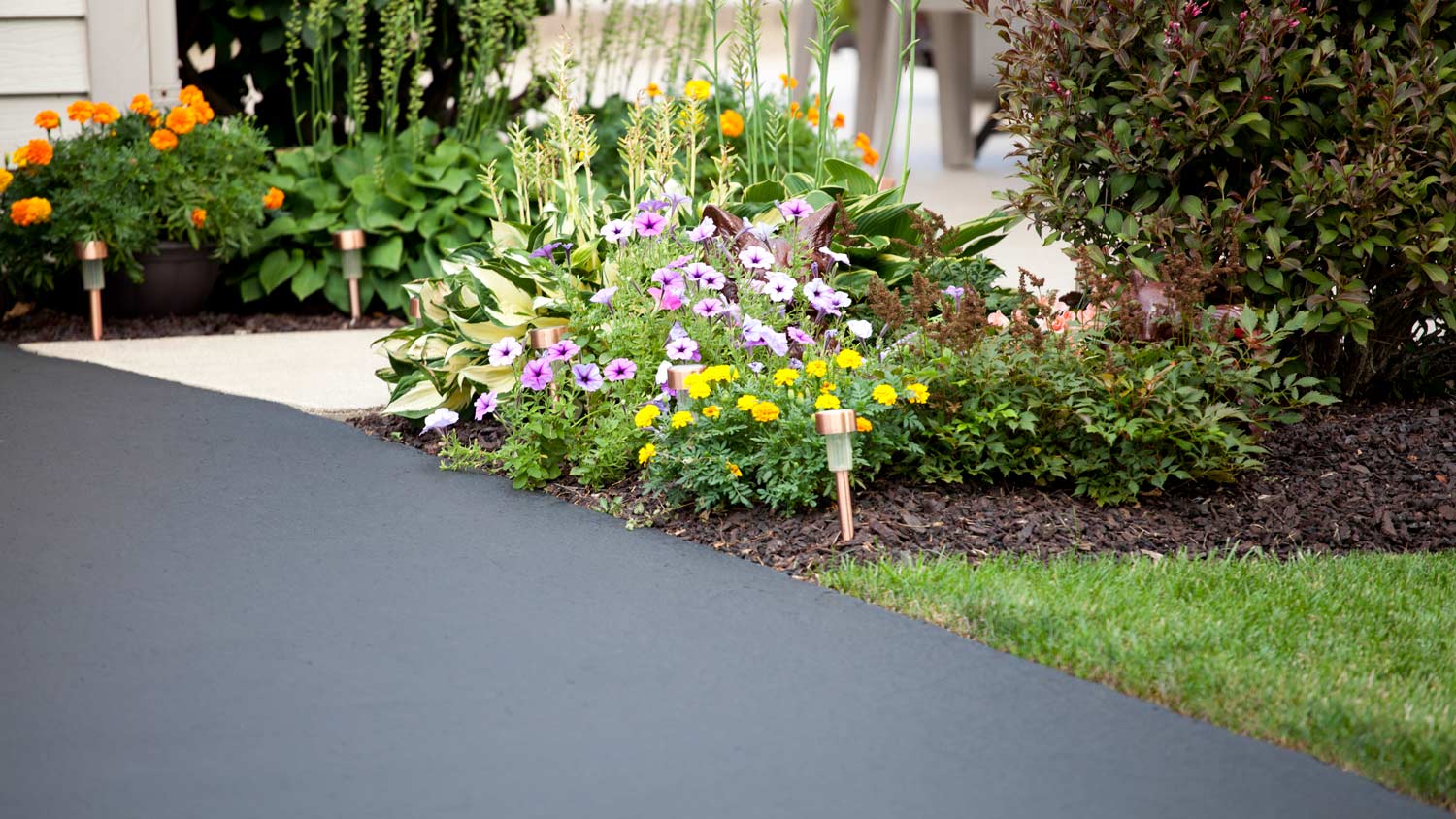 Close-up of a house’s asphalt driveway