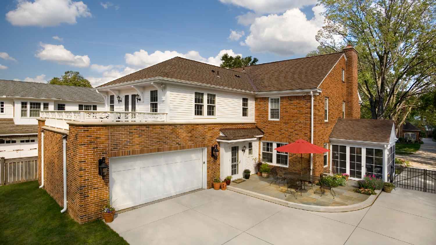 The exterior of a house with a white garage door