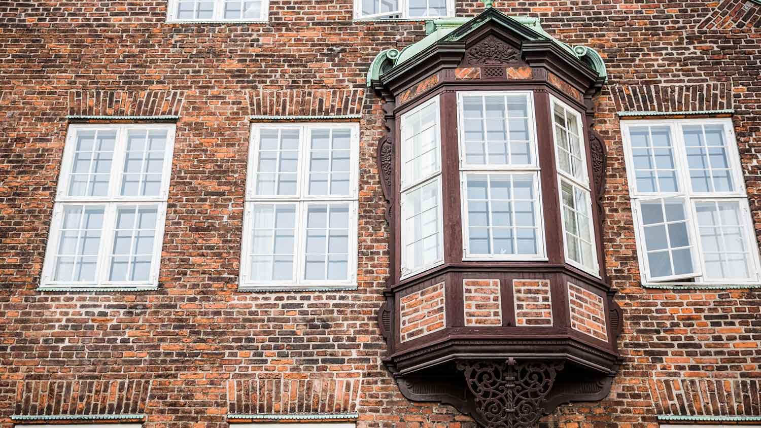 Oriel window on the façade of a mansion