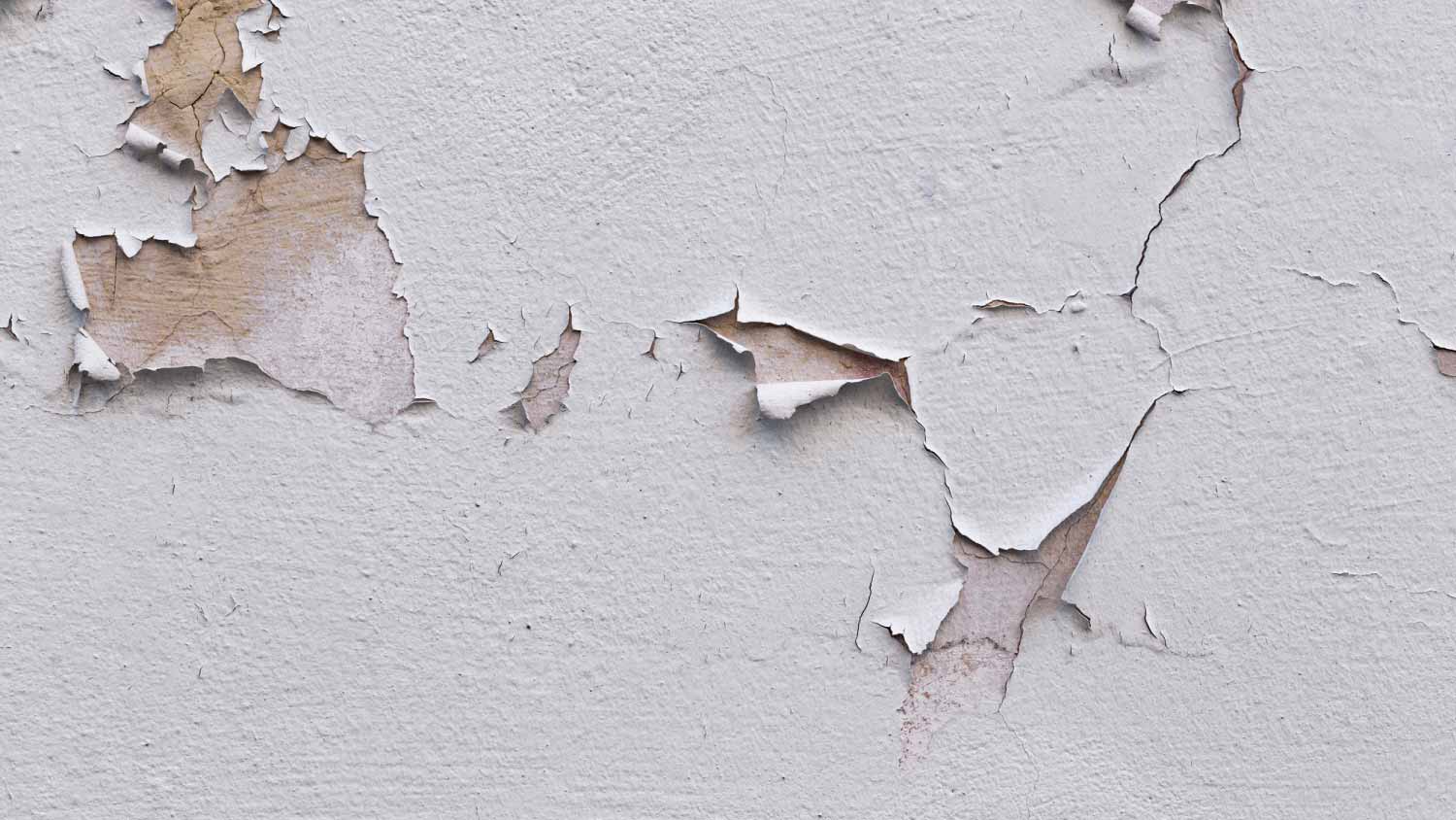 Facade wall covered with cracks