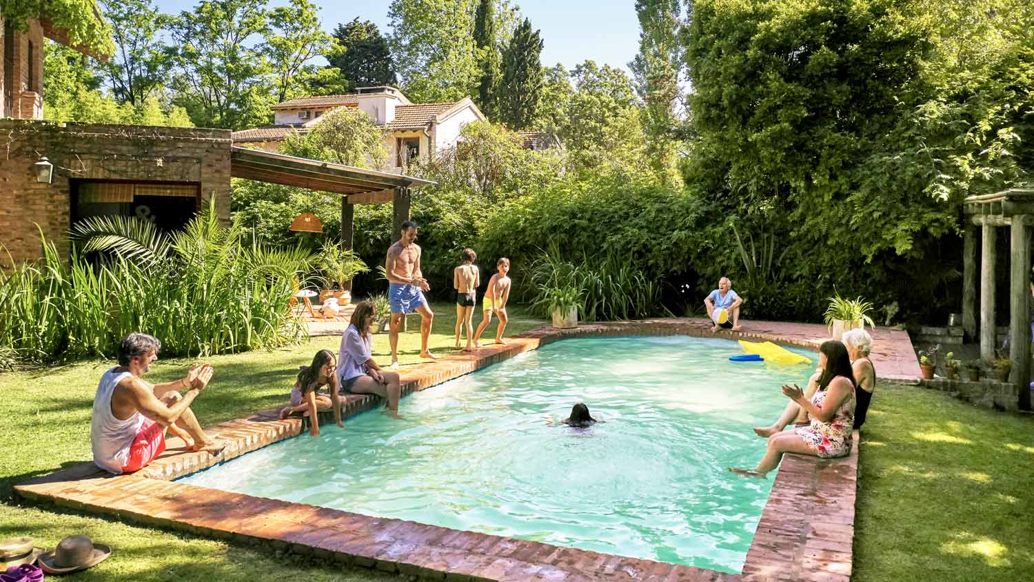 A family having fun by the pool