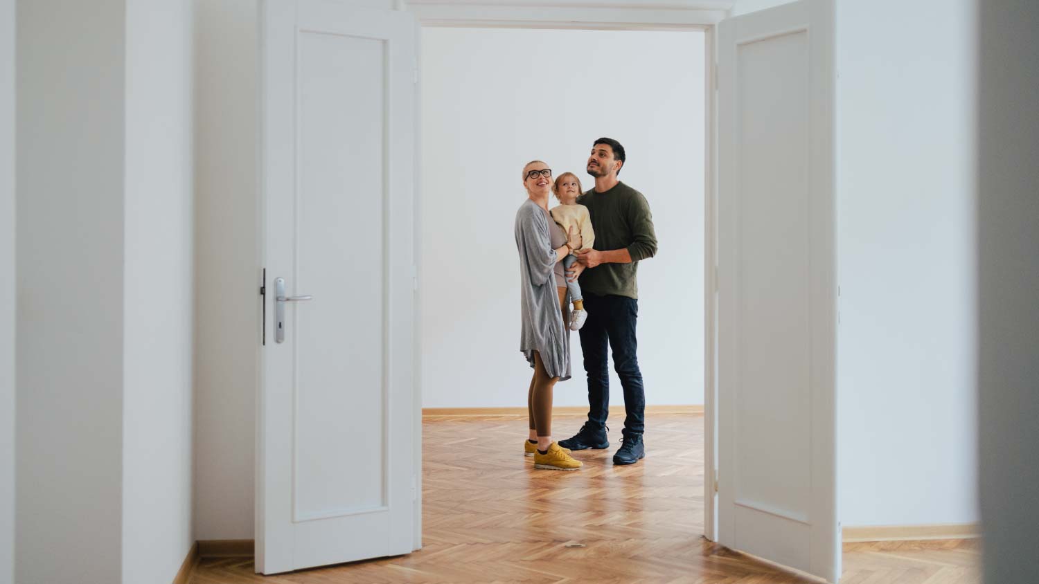 family touring empty home