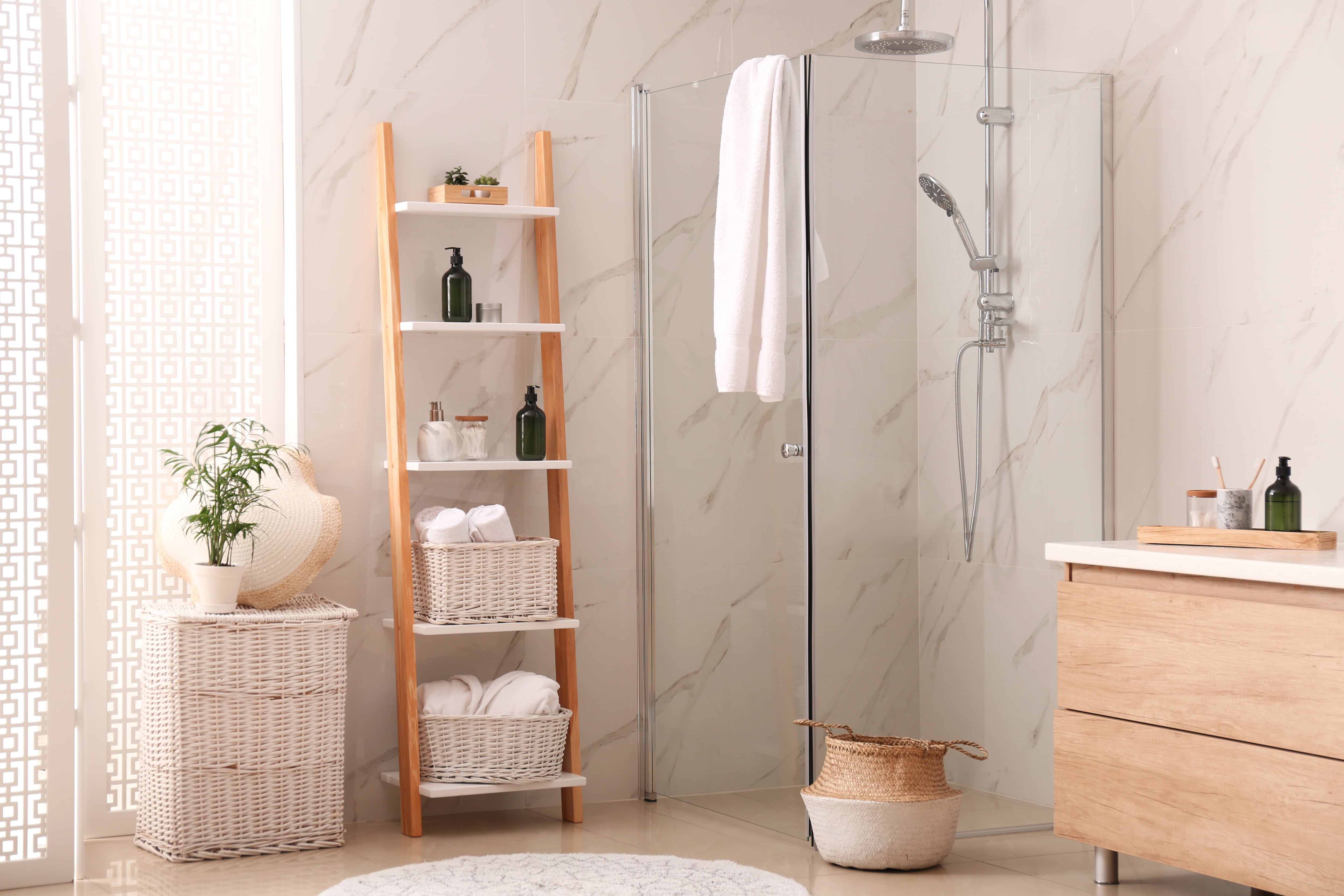 A wooden ladder towel rack