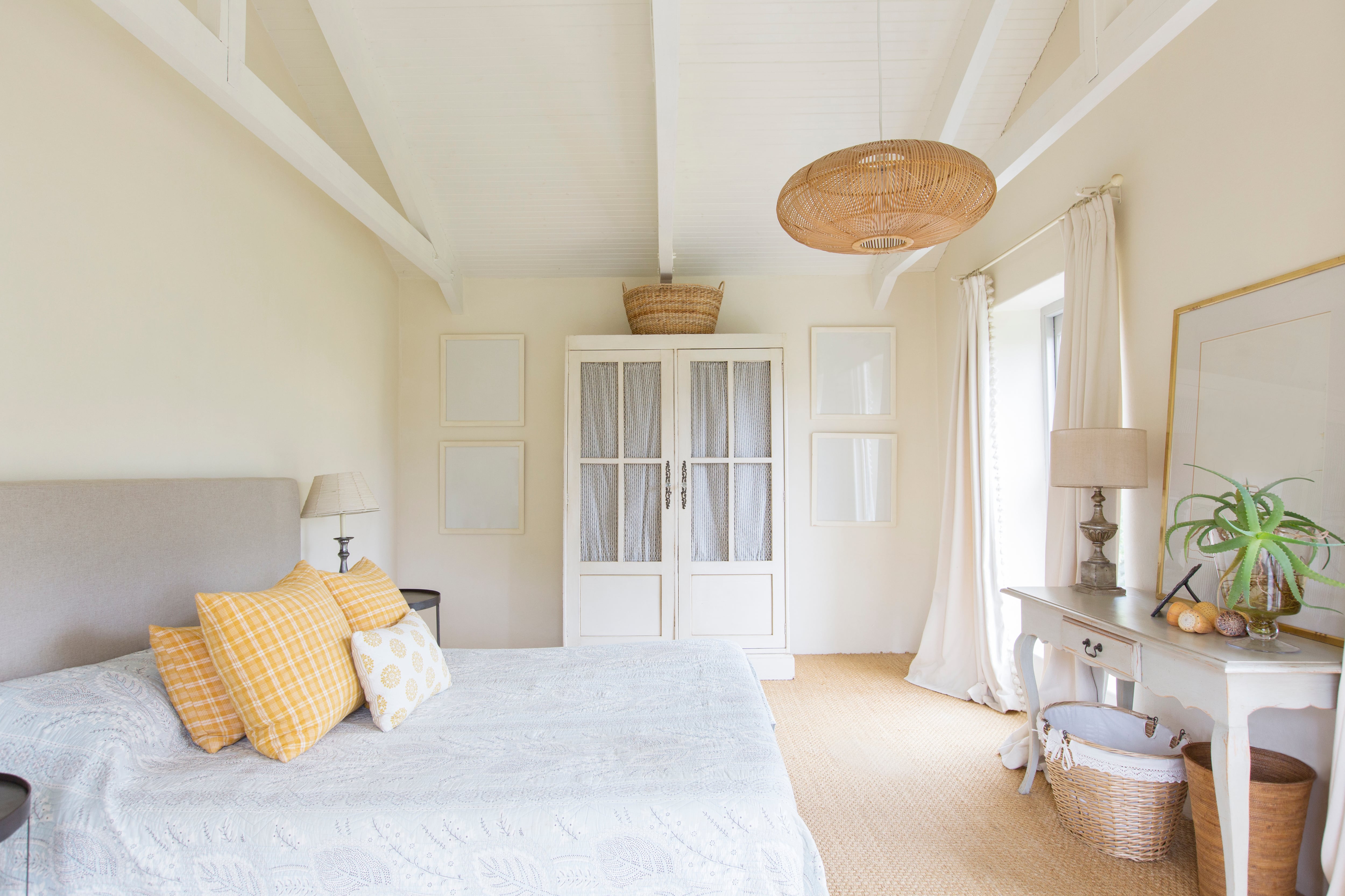 Rattan pendant light fixture in bedroom