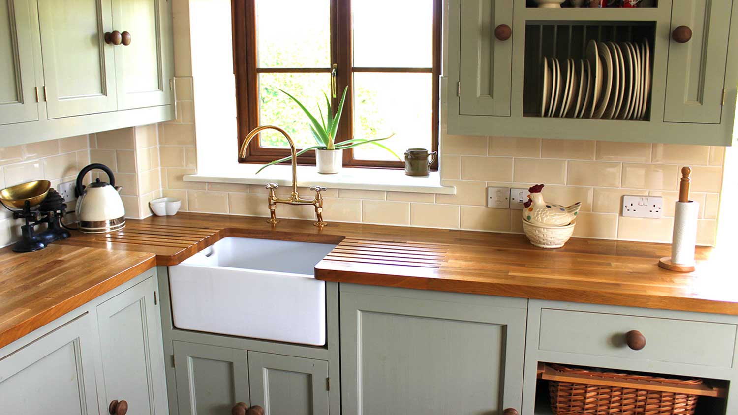 Farmhouse kitchen style with green cabinets