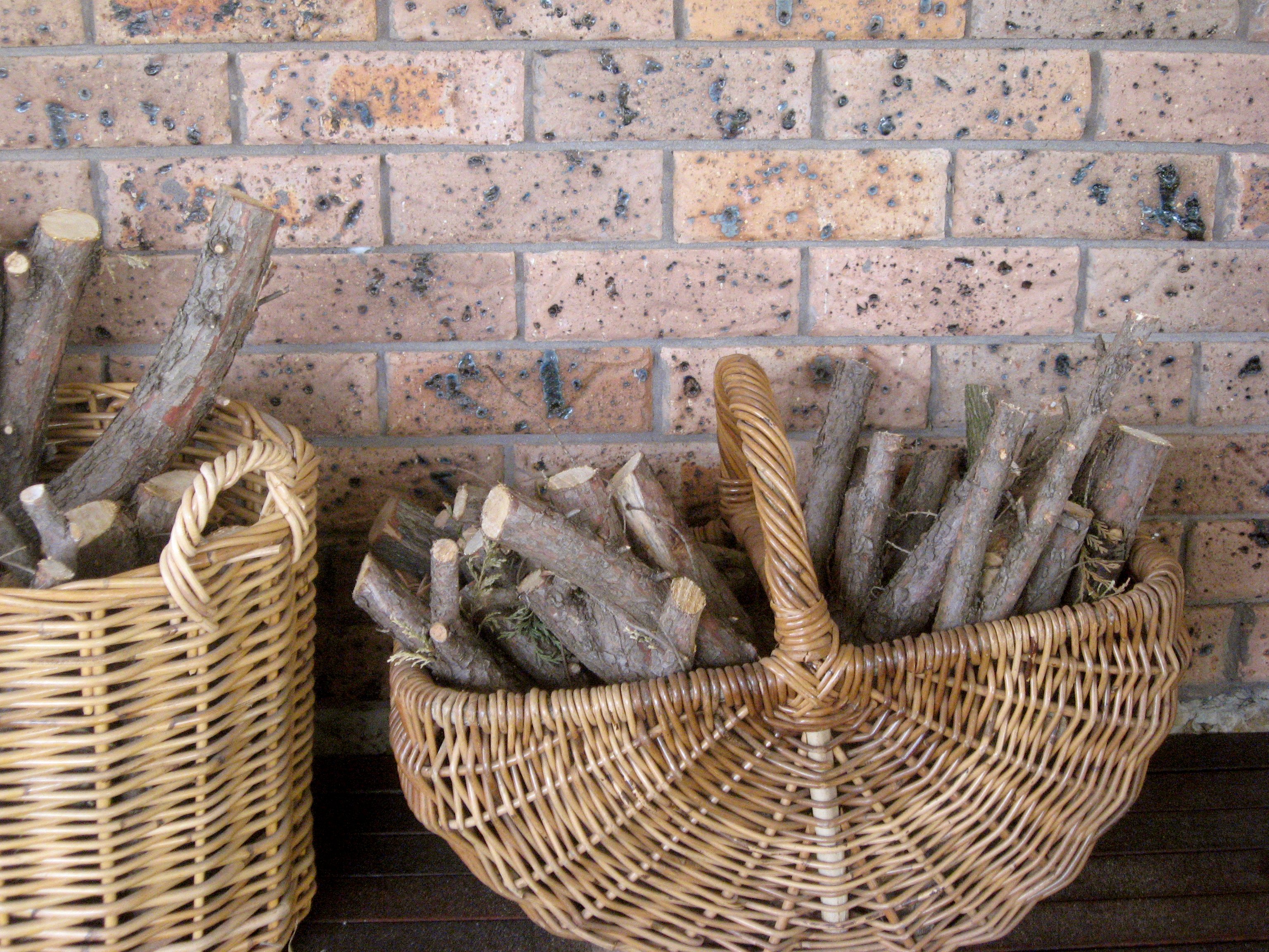firewood in wicker basket