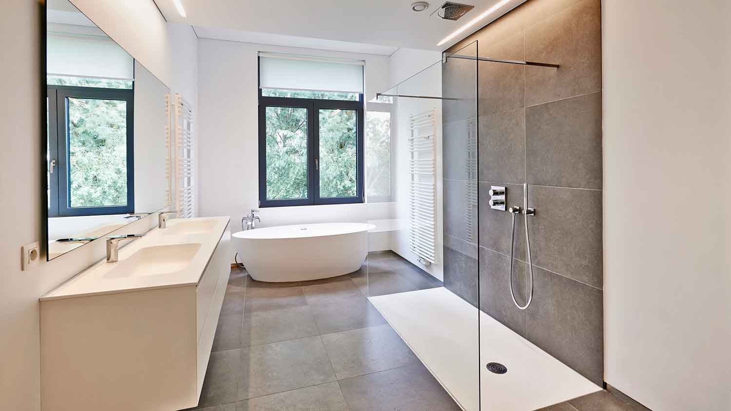 Minimalist bathroom with fixed shower door