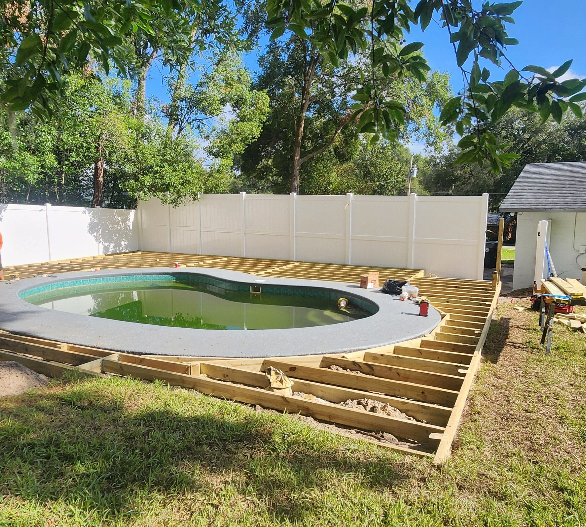 Pool with new vinyl fence 