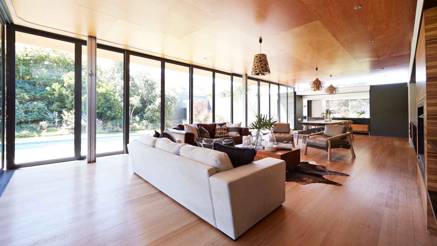 living room with floor to ceiling windows