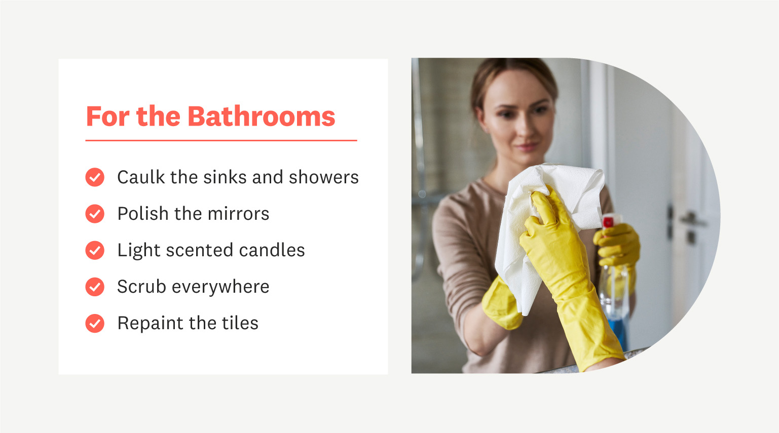 woman cleaning bathroom mirror