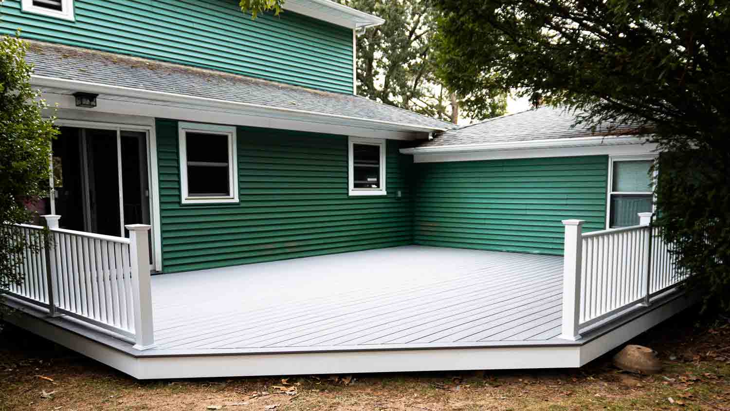 forest green dark siding house