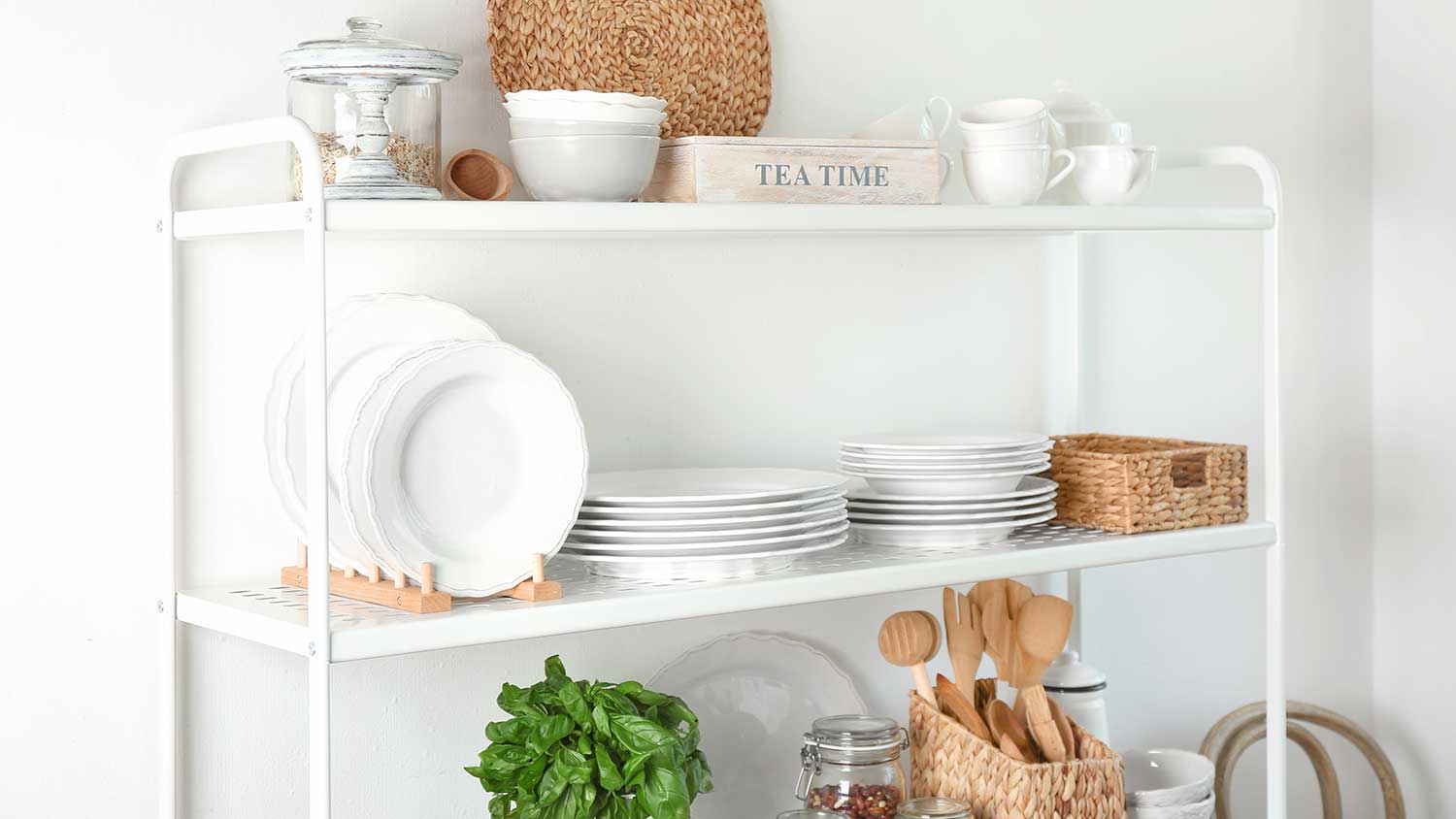 Free standing shelf with plates and utensils