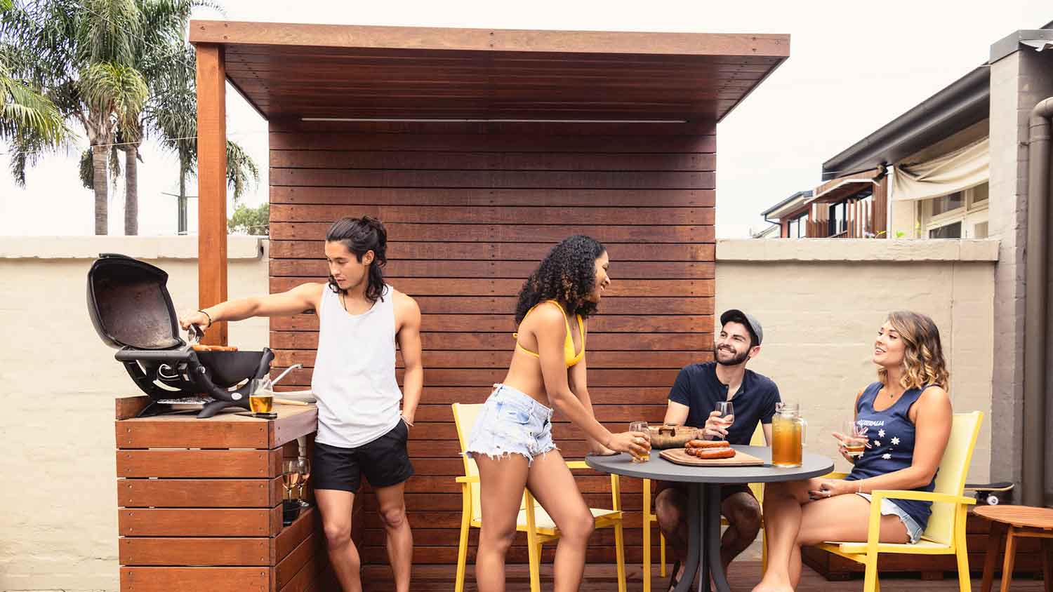 Friends enjoying barbecue on a deck