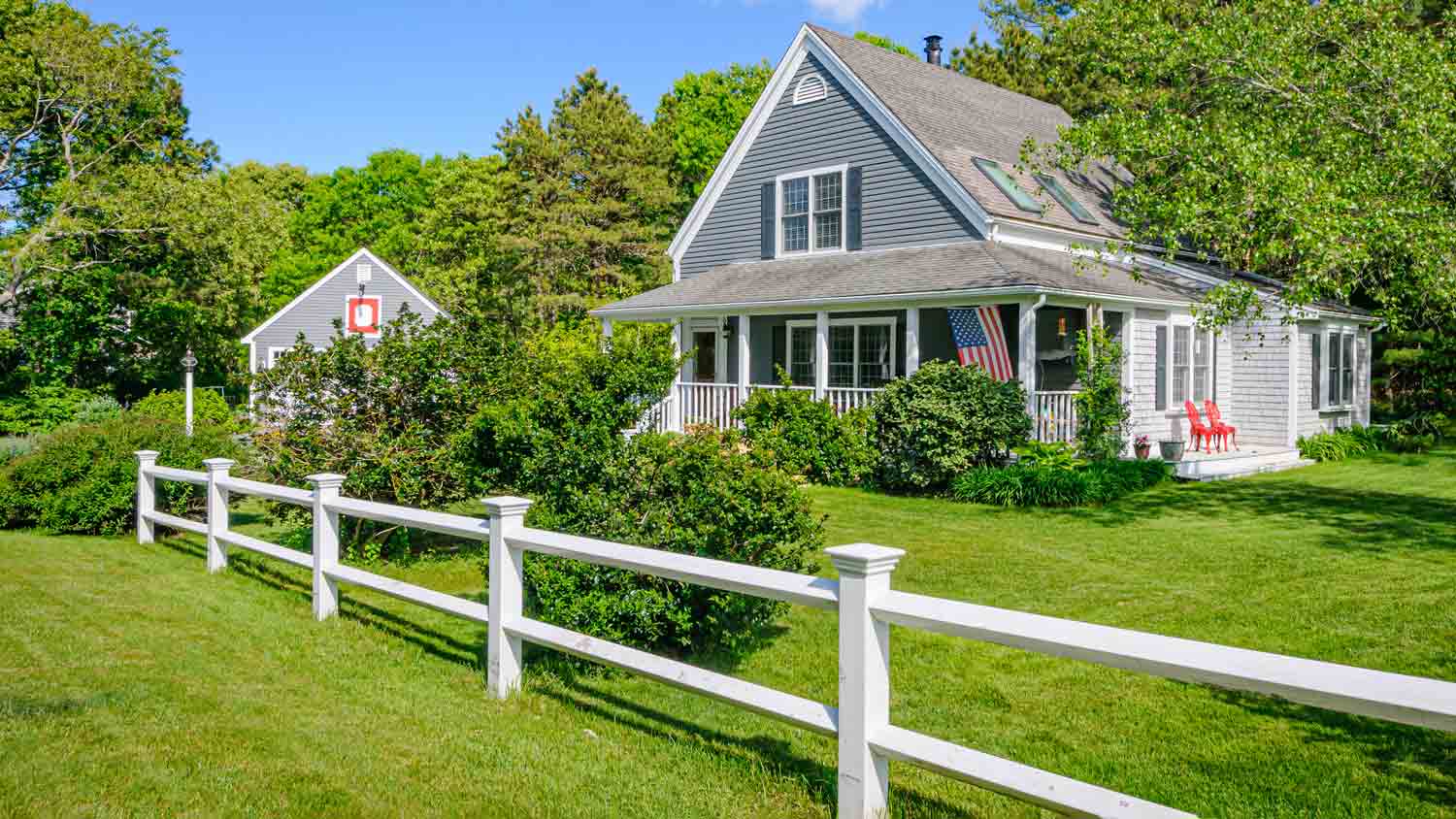 Front yard with white fence