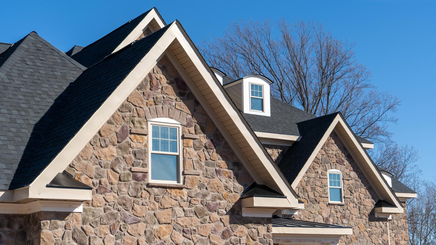 Double gabled roofs with fiber cement soffit