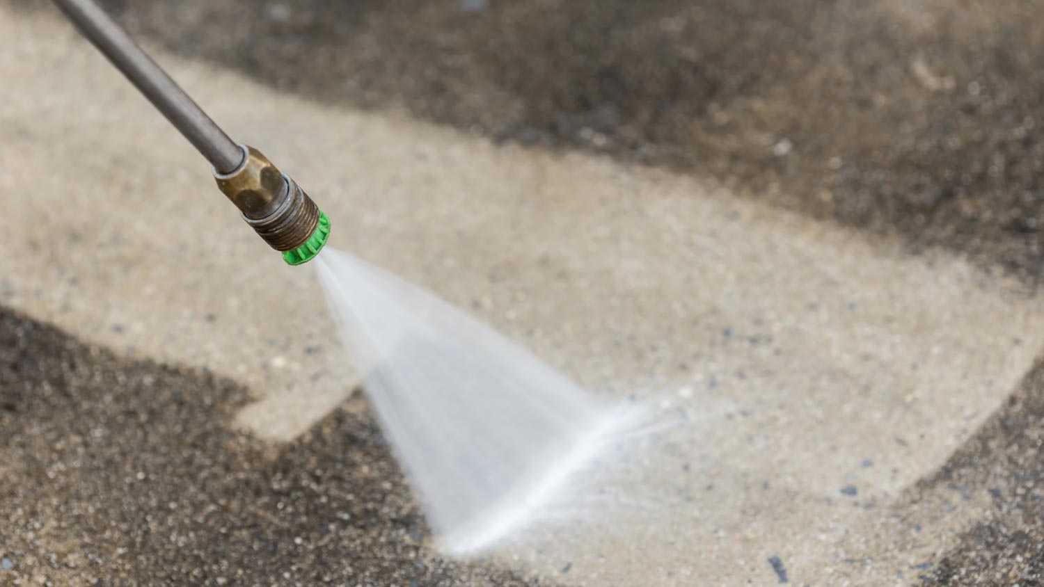 cleaning garage floor with power washer