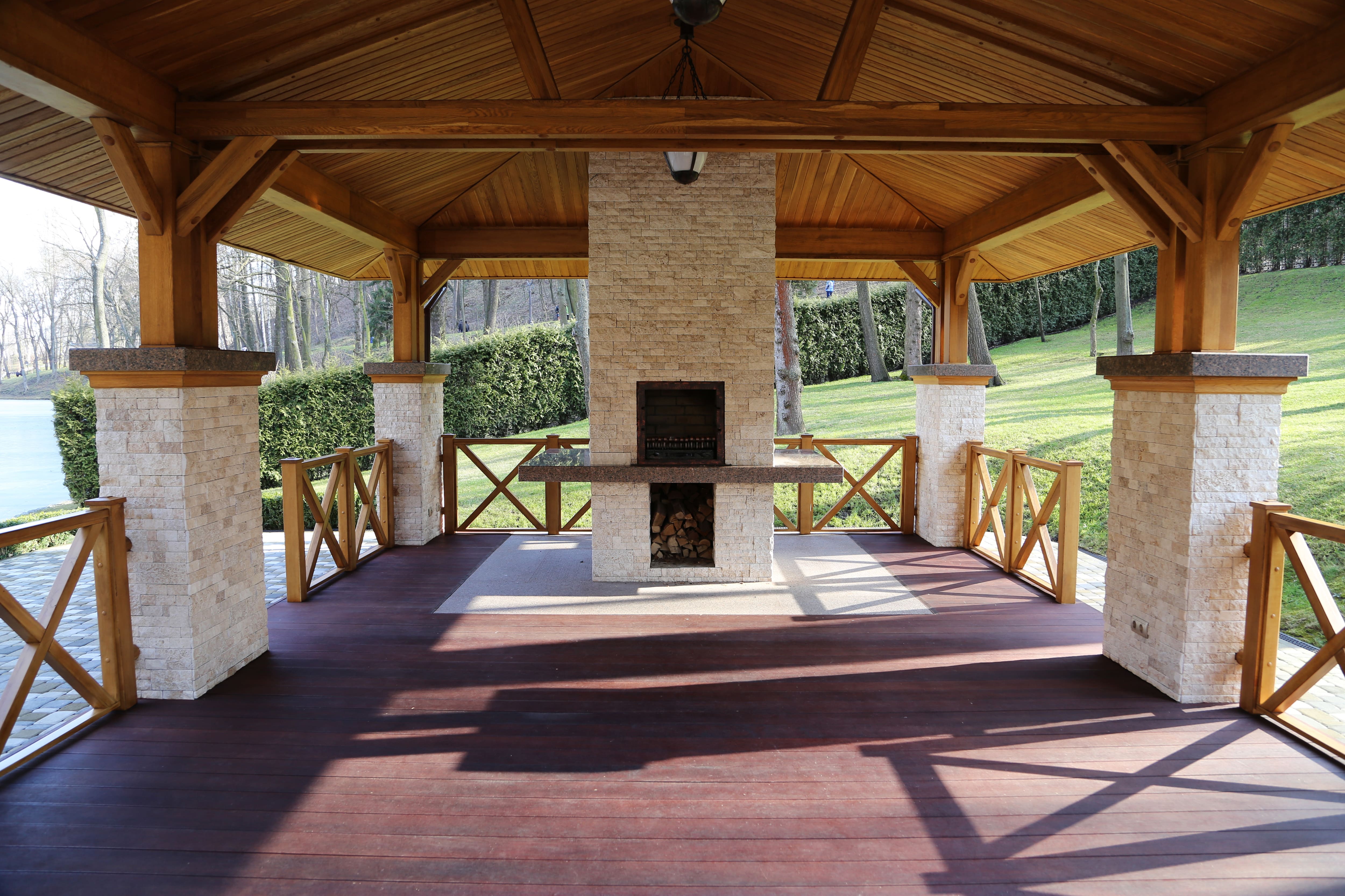 Covered gazebo with floor-to-ceiling fireplace