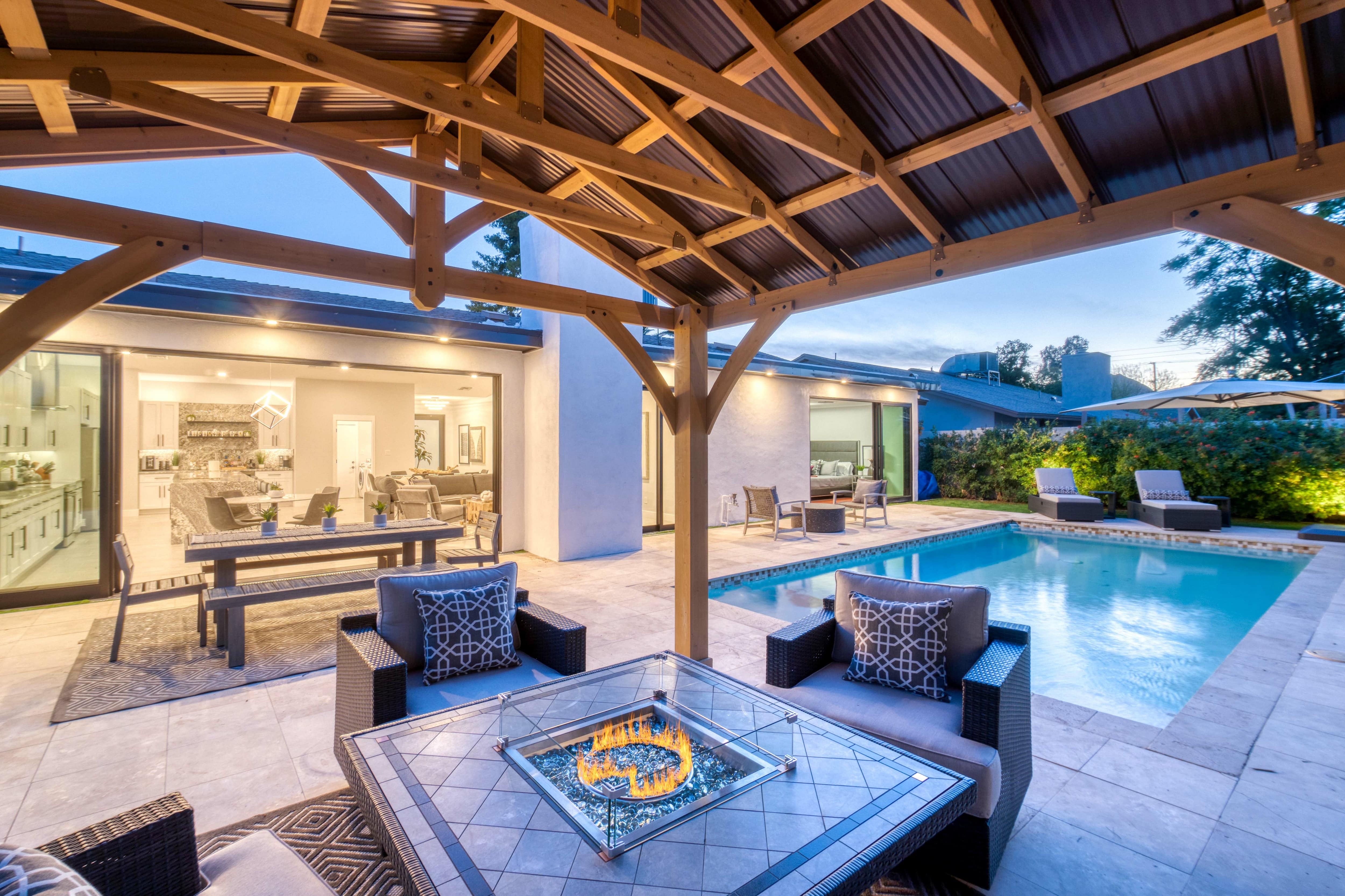 Gazebo with gas fire pit table underneath