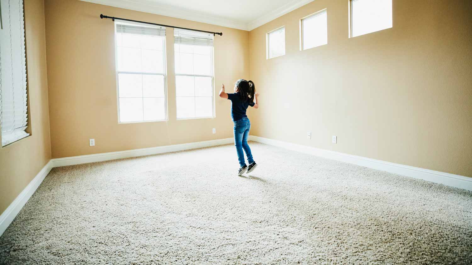 Girl dancing in empty room